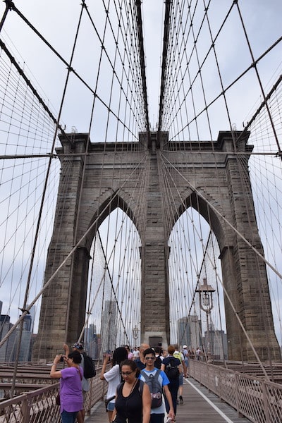People walking Brooklyn Bridge-4 Day New York Itinerary