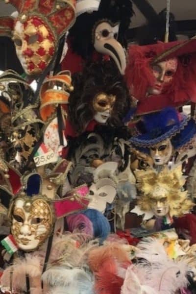 Venetian masks at mask stand Venice