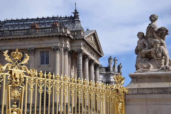 Pass through the Honour Gate Palace of Versailles on day trip from Paris