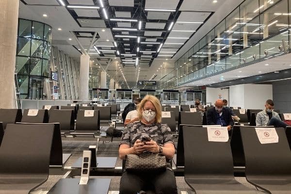 Woman wearing mask in airport