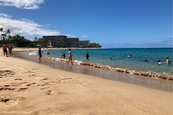 People on beach west Maui Hawaii 4 day itinerary