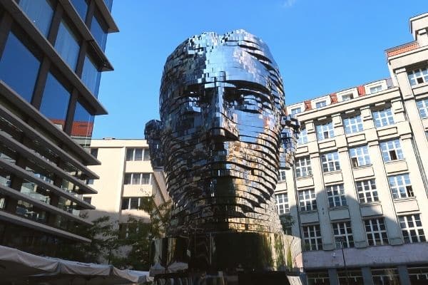 David Černý rotating Kafka Head Prague solo travel guide
