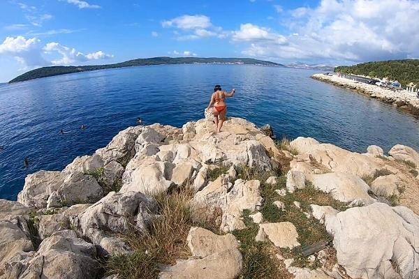 Cliff jumping at Kasjuni Beach for Split solo travel itinerary