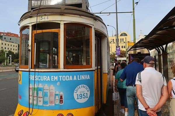Yellow Tram 28 at Martim Moniz stop Lisbon Portugal