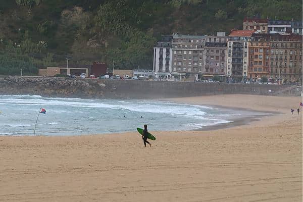 Surfer on Zurriola Beach San Sebastian Spain