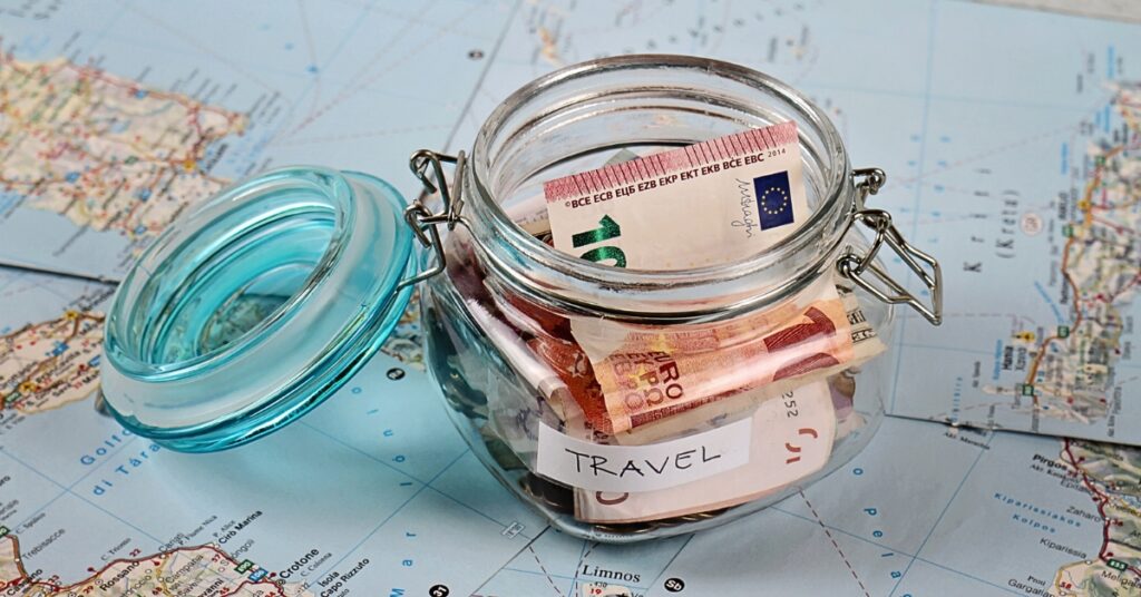 How to Travel On a Budget_money on map