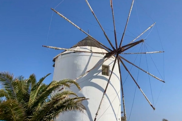 Windmill against blue sky Santorini Greece
