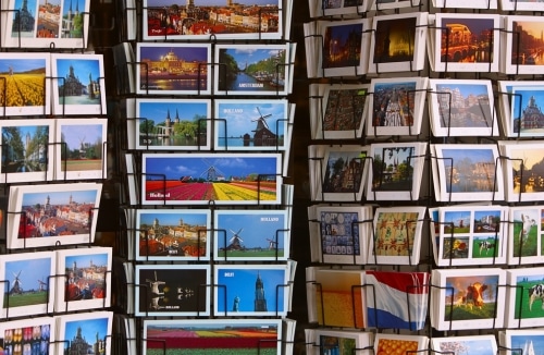 Travel postcards on rack