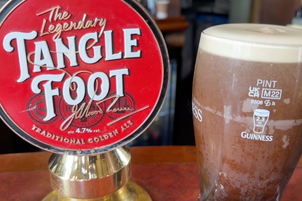 Tangle Foot ale pull and Guiness London England