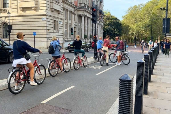 Tourists on bikes London England