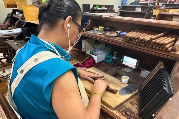 Woman making cigars at The Graycliff Nassau