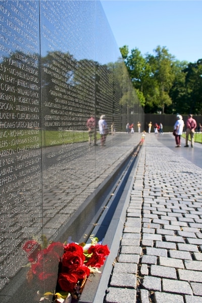 Flowers in front of Vietnam Memorial Washington DC