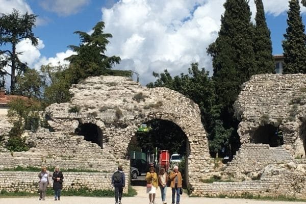 people in Nice Roman ruins